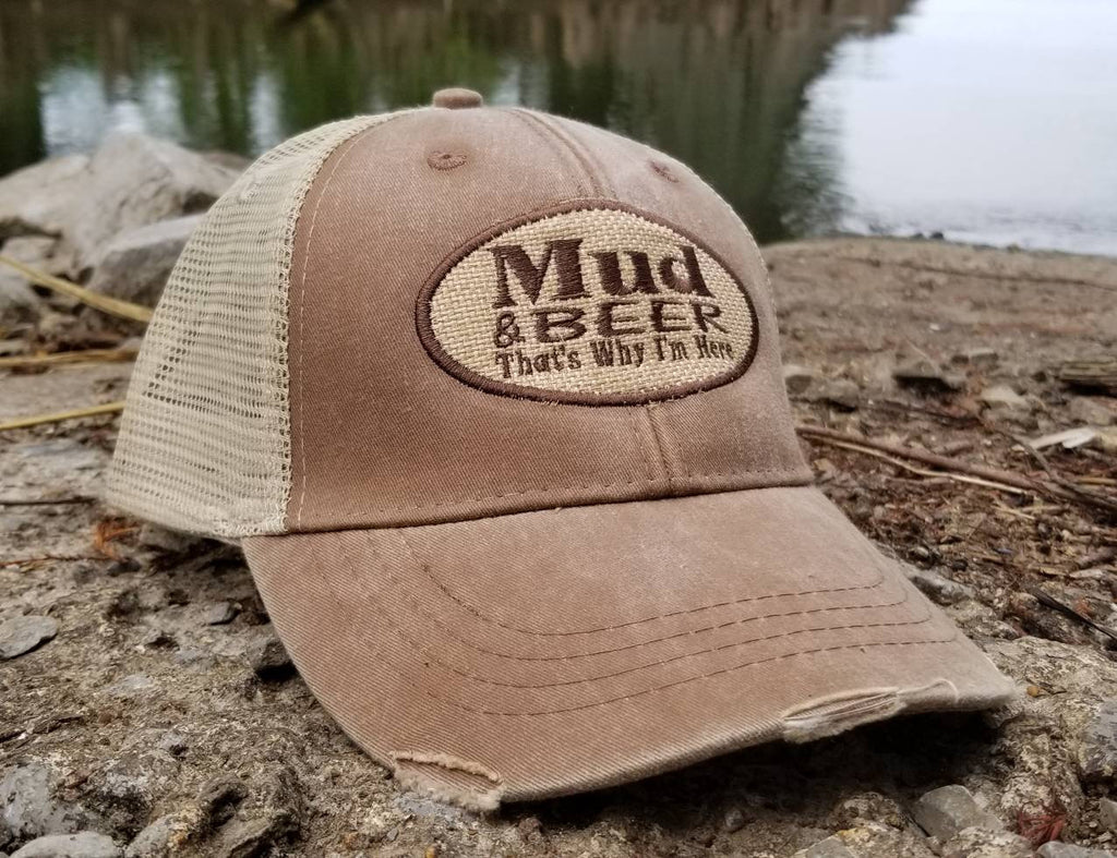 Mud and beer that's why I'm here, distressed trucker cap