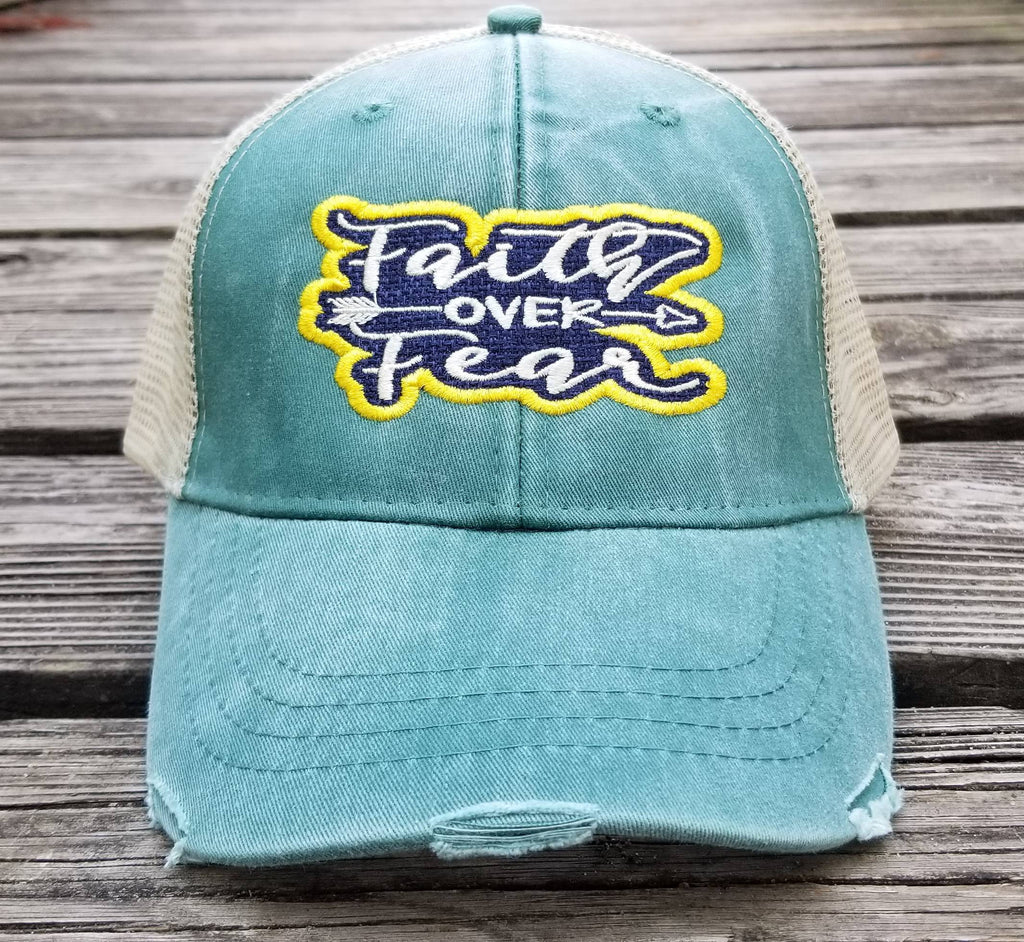 Faith Over Fear, outlined patch work on a forrest green distressed trucker hat